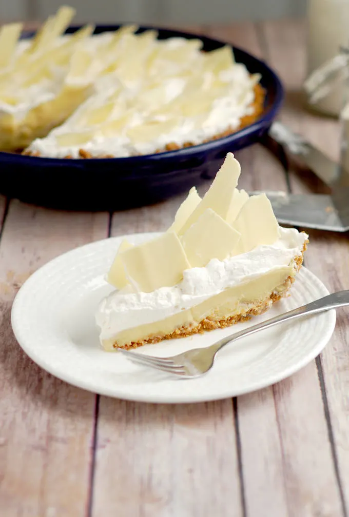 a slice of malted milk cream pie with white chocolate shards