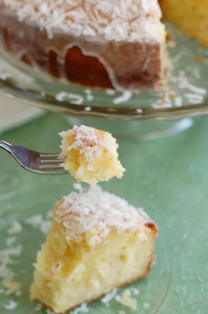 a bite of coconut pound cake on a fork.