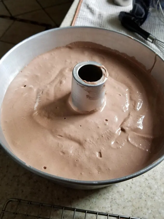 chocolate angel food cake batter in a pan