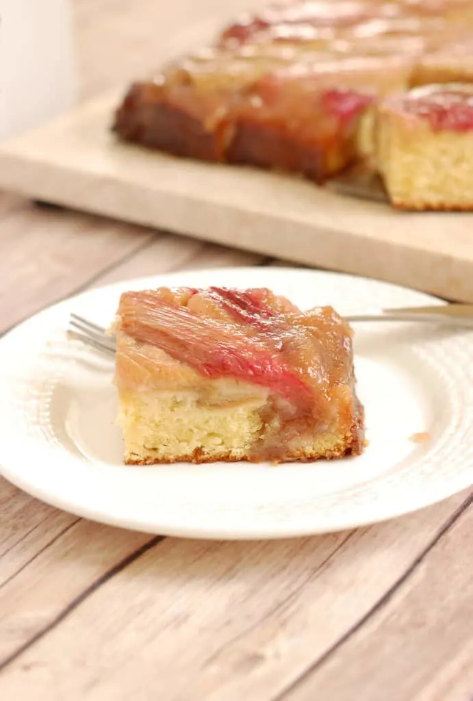 a slice of rhubarb upside down cake on a plate