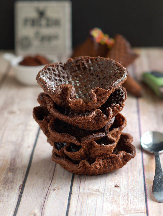 a stack of chocolate waffle cone bowls