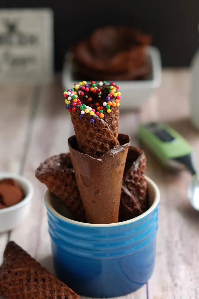 Ice cream cones in glass containers stock photo - OFFSET