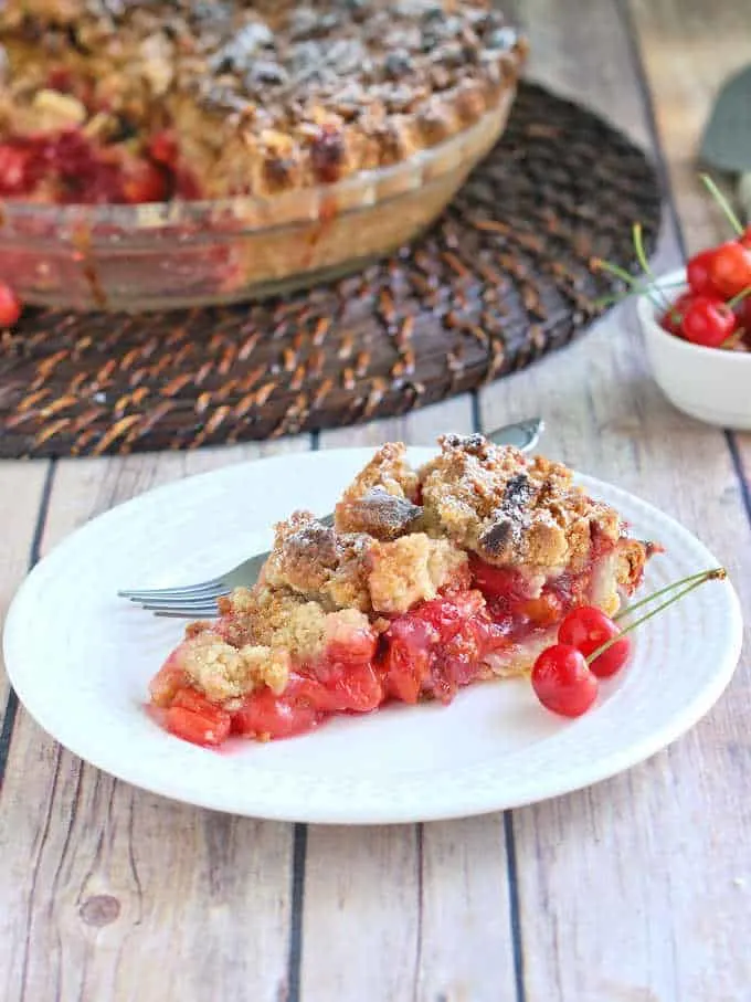 a slice of sour cherry crumb pie