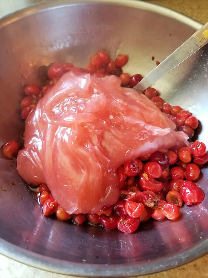 A bowl of cherry pie filling