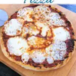 a pinterest image for how to charcoal grill pizza