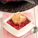 a bowl of sour cherry cobbler