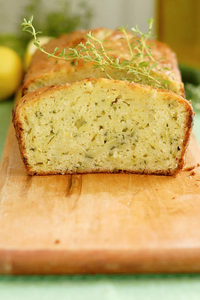 a closeup shot of a slice of zucchini bread