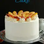 a pinterest image for peach melba cake recipe