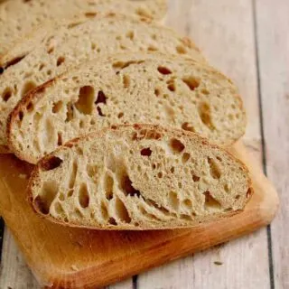 slices of sourdough rye bread on a cutting board