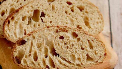 slices of sourdough rye bread on a cutting board