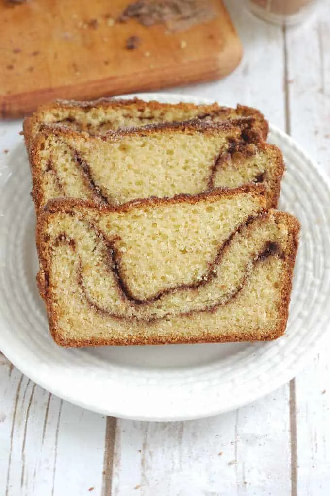 three slices of snickerdoodle bread on a white plate