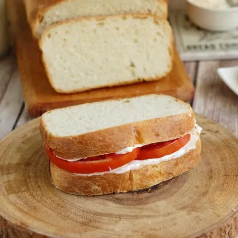a tomato sandwich on sourdough sandwich bread