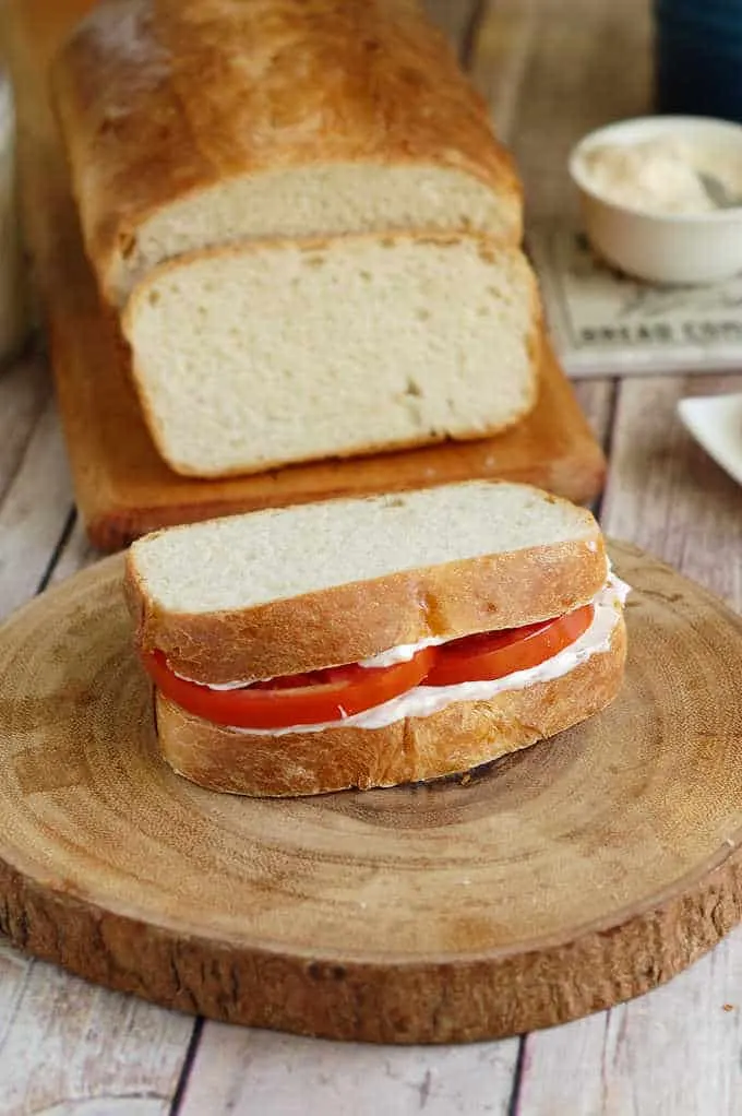 a tomato sandwich on sourdough sandwich bread