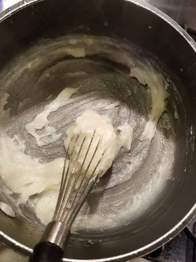 a pot with pear juice and cornstarch cooked together