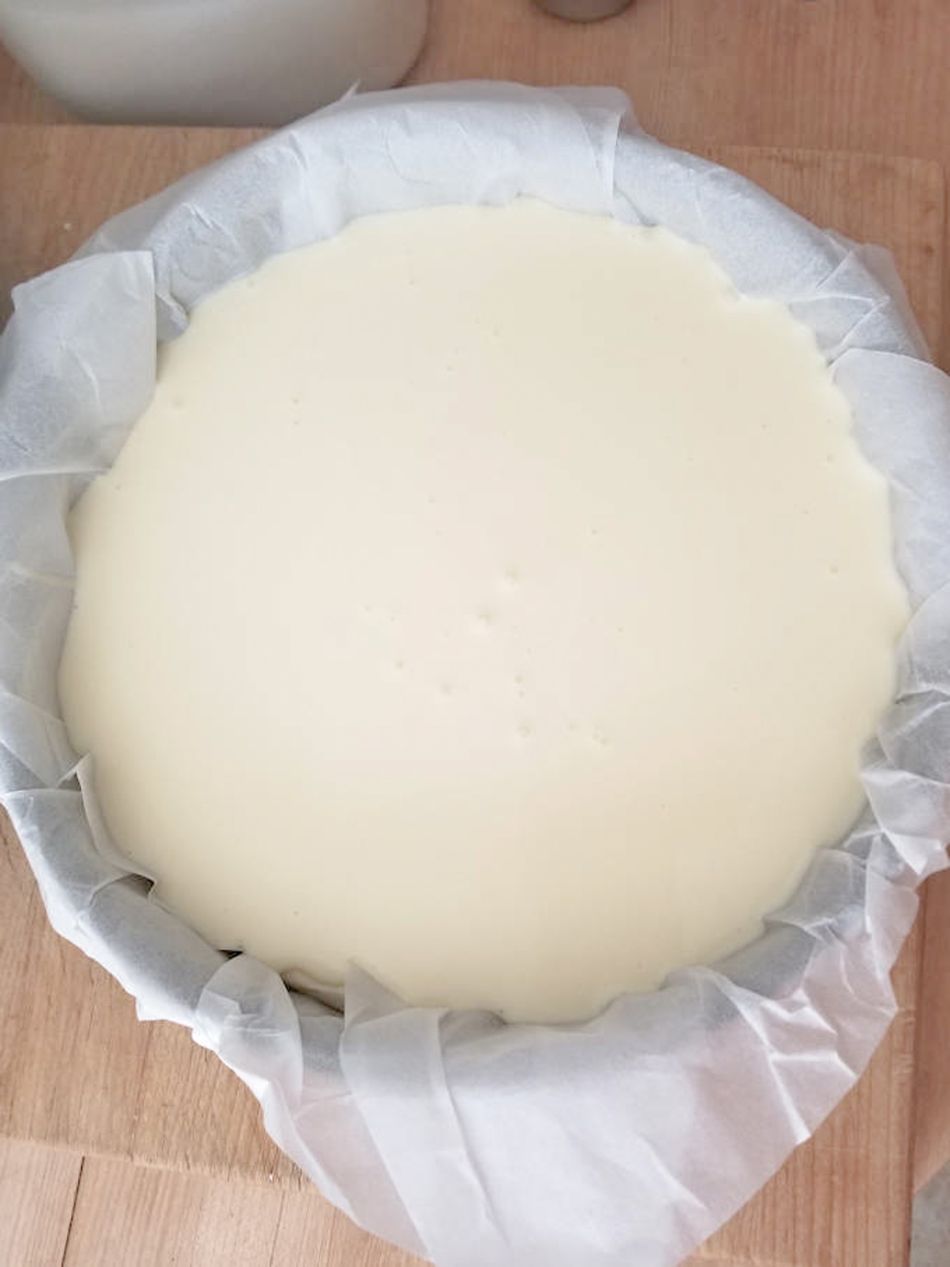 basque cheesecake batter in a pan before baking.