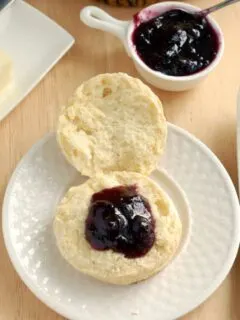 a sourdough scone with preserves on top