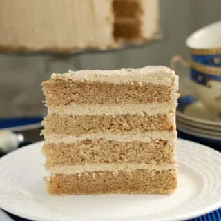 a slice of spice cake on a white plate