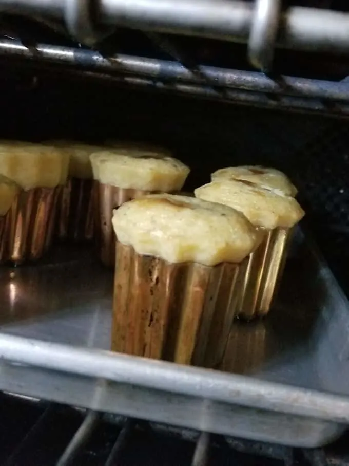 caneles baking in the oven