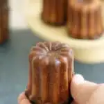 a pinterest image for caneles recipe