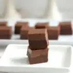 two layered hazelnut truffles on a plate