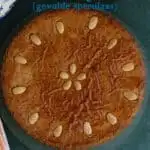 a pinterest image for filled speculaas cake