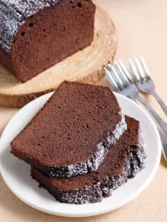two slices of chocolate pound cake on a plate