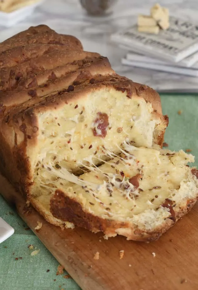 photo showing the interior of bacon & pepper jack pull apart bread.