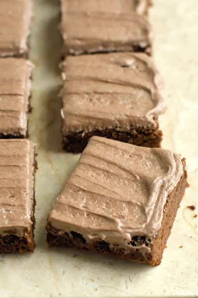 a tray of malted milk brownies with malted chocolate frosting