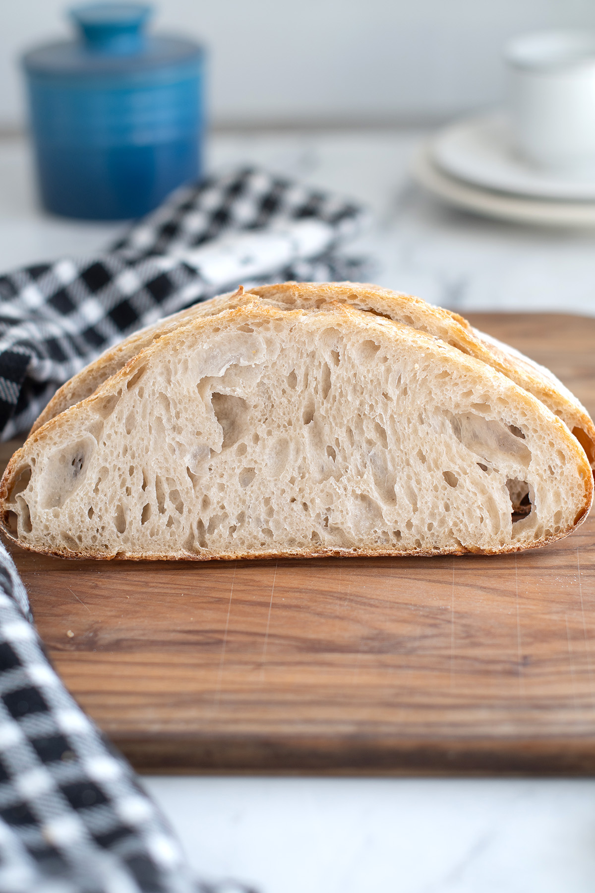 a slice of sourdough bread on a cutting board.