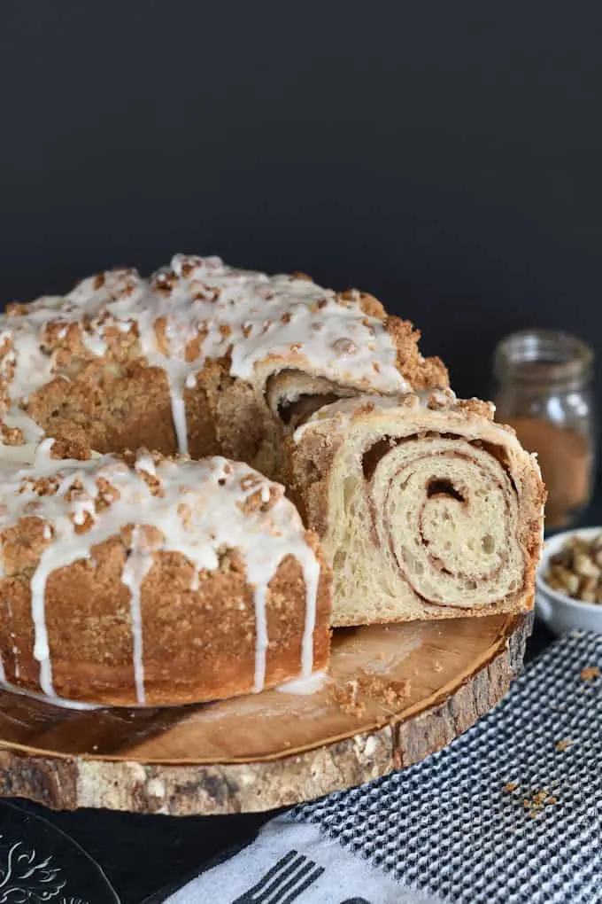 a sliced sourdough coffee cake on a cake stand