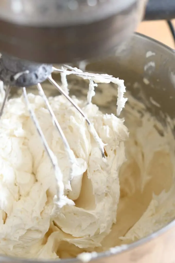 a closeup shot of a bowl full of american buttercream