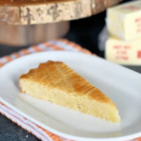 a slice of dutch boterkoek on a plate