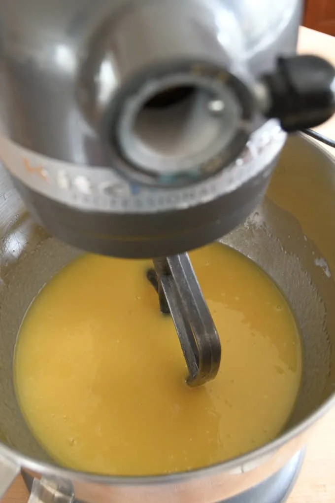 a closeup shot of eggs and oil in a mixing bowl for cake batter