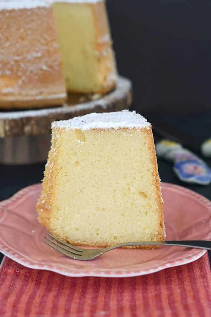 a slice of vanilla chiffon cake on a plate