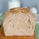a closeup shot of a loaf of sourdough whole wheat bread