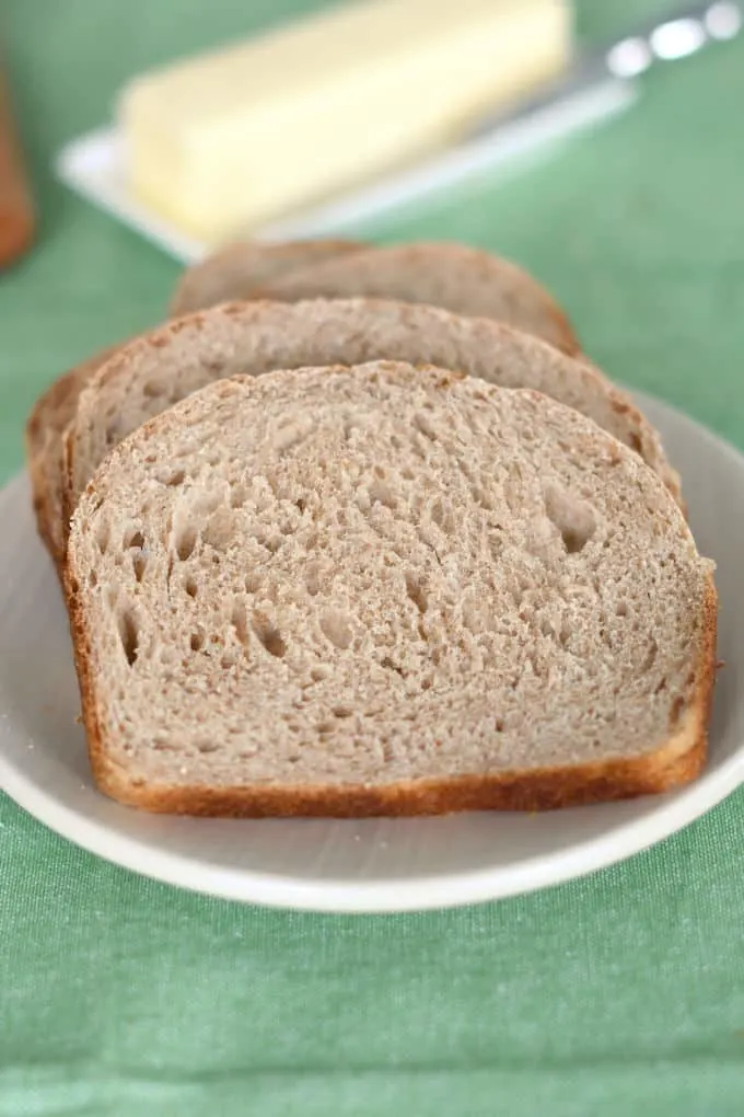 slices of whole wheat sourdough bread on a plate