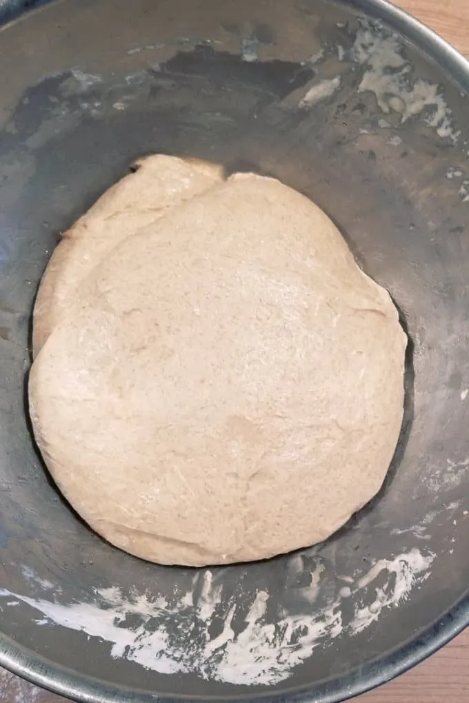 a bowl of sourdough whole wheat bread dough