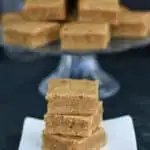 a stack of blondies on a white plate