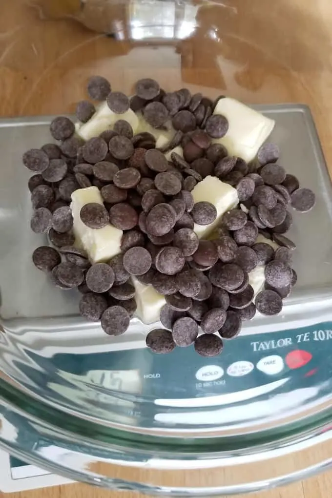 butter and chocolate being weighed to make fudgy brownies