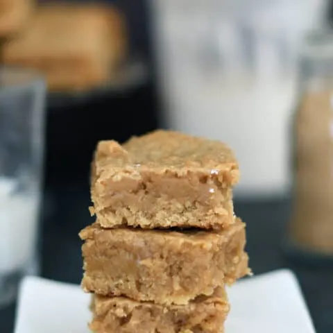a plate with three sourdough blondies