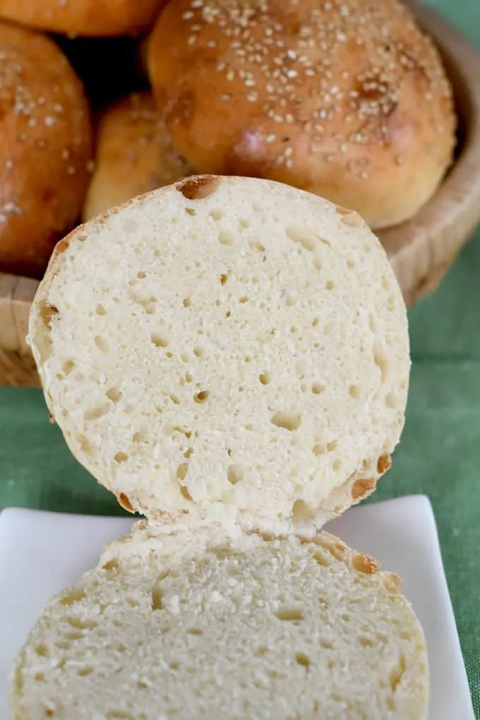 showing the crumb on a sourdough hamburger bun