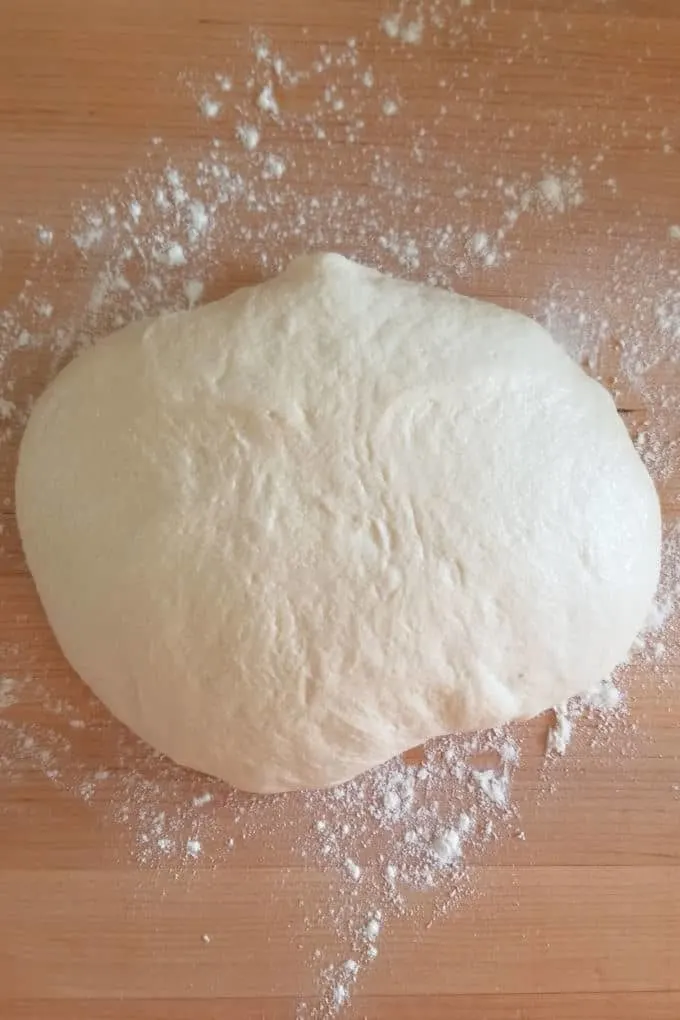 sourdough semolina bread dough on a floured surface