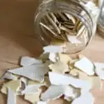 dried starter chips spilled from a jar