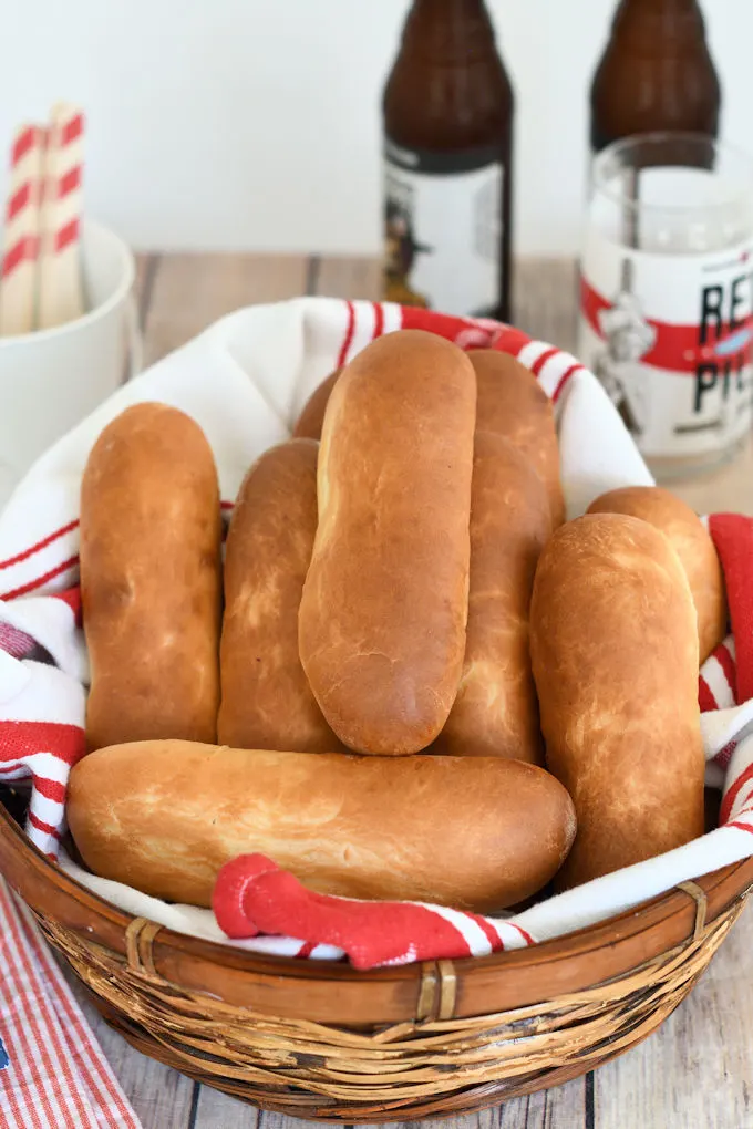 a basket of freshly baked hot dog buns