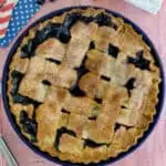 a pinterest image of blueberry pie with text overlay