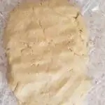 a slab or cornmeal pie crust in plastic wrap