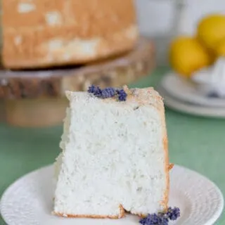 a slice of lemon lavender angel food cake on a plate