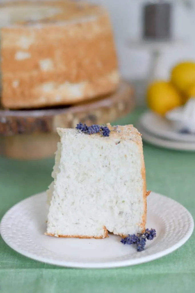 a slice of lemon lavender angel food cake on a plate