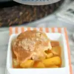 an image of fresh peach cobbler for pinterest with text overlay
