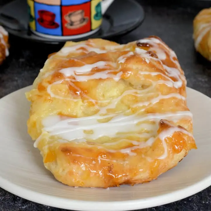 two homemade cheese danish on a plate